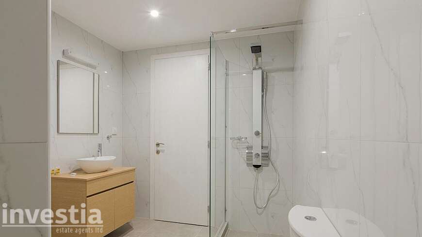 7 apartments plus a ground-floor cafeteria/restaurant for sale/Athens,Greece.