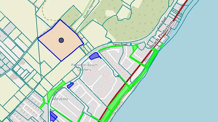 Large plot of land near the sea with plans for 57 houses.