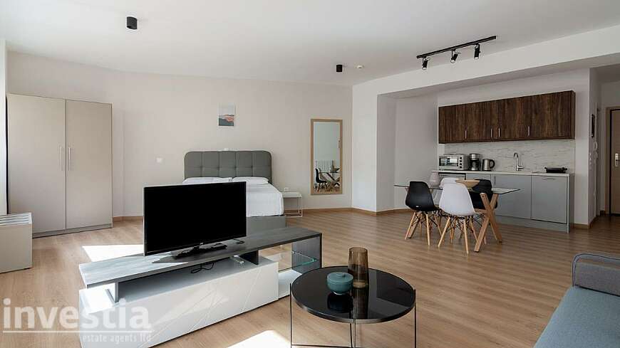 7 apartments plus a ground-floor cafeteria/restaurant for sale/Athens,Greece.