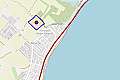 Large plot of land near the sea with plans for 57 houses.