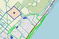 Large plot of land near the sea with plans for 57 houses.